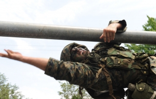 Candidate On An LRC Obstacle At Officer Candidates School